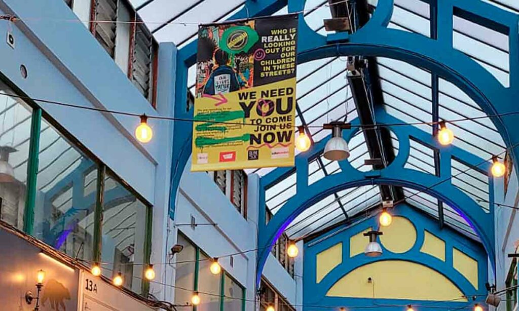 banner hanging in indoor market